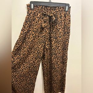Wide cheetah print pants.